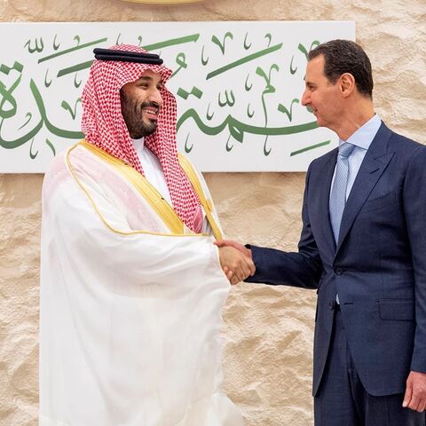 Saudi Crown Prince Mohammed bin Salman greets Syrian President Bashar Assad during the Arab summit in Jeddah, Saudi Arabia, on Friday. Saudi Press Agency / Saudi Press Agency via AP