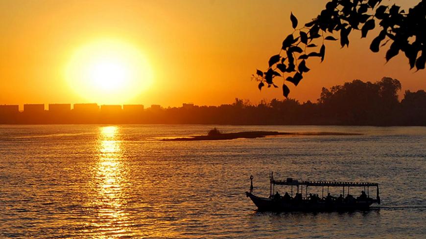 The sun sets over the Nile River in Aswan 1,000 kms south of Cairo on May 13, 2010.  Four African countries signed on May 14, 2010 a new treaty on the equitable sharing of the Nile waters despite strong opposition from Egypt and Sudan who have the lion's share of the river waters. AFP PHOTO/AMGAD FOUAD (Photo credit should read AMGAD FUAD/AFP/Getty Images)