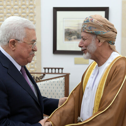 RAMALLAH, WEST BANK - OCTOBER 31: (----EDITORIAL USE ONLY  MANDATORY CREDIT - "PALESTINIAN PRESIDENCY / HANDOUT" - NO MARKETING NO ADVERTISING CAMPAIGNS - DISTRIBUTED AS A SERVICE TO CLIENTS----) Palestinian President Mahmoud Abbas (L) meets Omani Minister for Foreign Affairs, Yusuf bin Alawi (R) in Ramallah, West Bank on October 31, 2018. (Photo by PALESTINIAN PRESIDENCY / HANDOUT/Anadolu Agency/Getty Images)