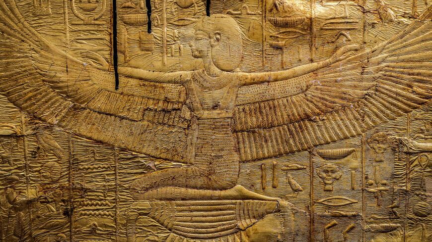 A relief from the foot of the golden sarcophagus of the Egyptian Pharaoh Tutankhamun (r. 1342–1325 BC) in the restoration lab of the new Grand Egyptian Museum (GEM), Giza, Sept. 21, 2019.