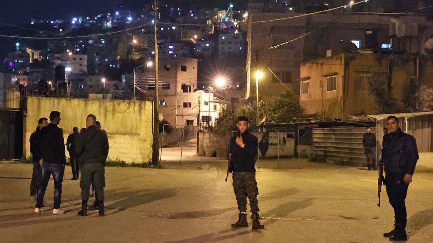 Members of the Palestinian Authority's security force deploy near the Jewish pilgrimage site of the Tomb of Joseph on the outskirts of Nablus in the occupied West Bank, early on April 11, 2022.