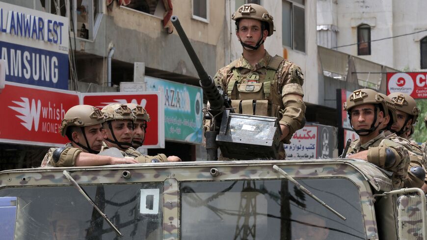 LEBANON-VOTE A Lebanese army soldier mans the turret of a humvee (HMMWV) while on patrol in the southern city of Nabatiyeh, on May 15, 2022 during the national parliamentary elections. (Photo by Mahmoud ZAYYAT / AFP) (Photo by MAHMOUD ZAYYAT/AFP via Getty Images)