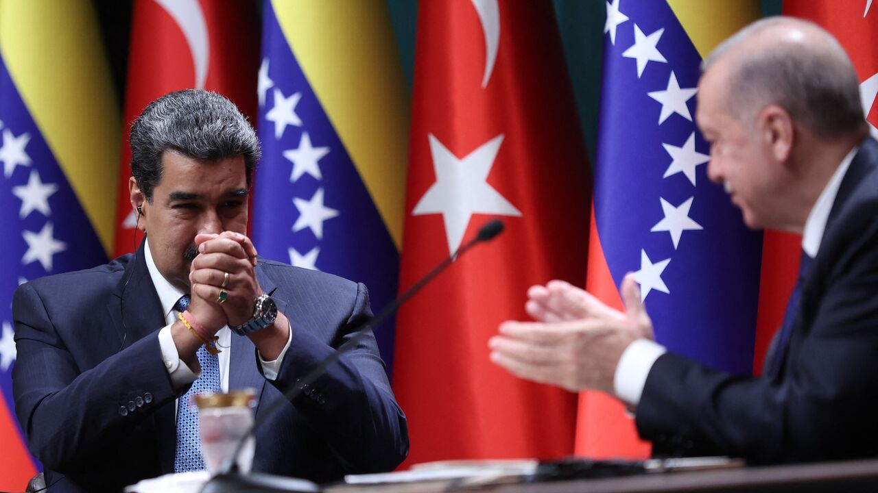 Turkey's president, Recep Tayyip Erdogan (R), and his Venezuelan counterpart Nicolas Maduro (L) attend a joint press conference after their meeting in Ankara on June 8, 2022.