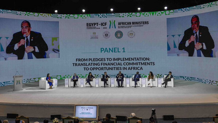 A guest walks in the lobby of Al-Masa Hotel during an African Ministers of Finance Economy and Environment Meeting for the COP27 climate summit, at the New Administrative Capital, east of Cairo, Egypt, Sept. 7, 2022.