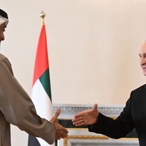 Russian President Vladimir Putin meets with United Arab Emirates President Sheikh Mohamed bin Zayed Al-Nahyan in Saint Petersburg on Oct. 11, 2022.