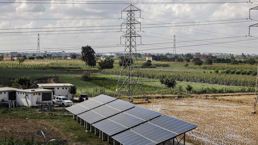 This picture taken on October 12, 2022 shows a view of solar panels used to power irrigation pumps along the Afir agricultural canal near the city of Kafr el-Dawwar in Egypt's northern province of Beheira. (Photo by Khaled DESOUKI / AFP) (Photo by KHALED DESOUKI/AFP via Getty Images)