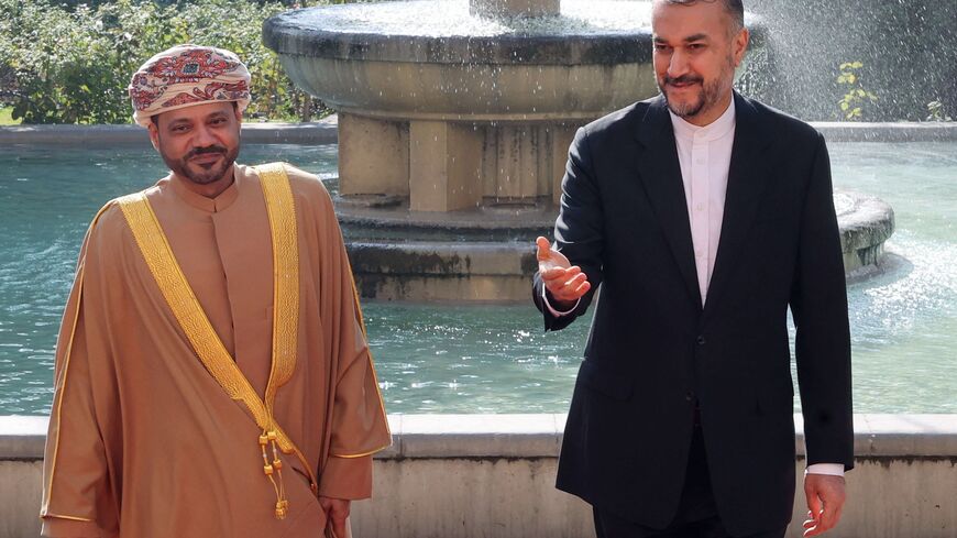 Iranian Foreign Minister Hossein Amir-Abdollahian (R) welcomes his Omani counterpart Sayyid Badr al-Busaidi in Tehran on November 19, 2022. (Photo by ATTA KENARE / AFP) (Photo by ATTA KENARE/AFP via Getty Images)