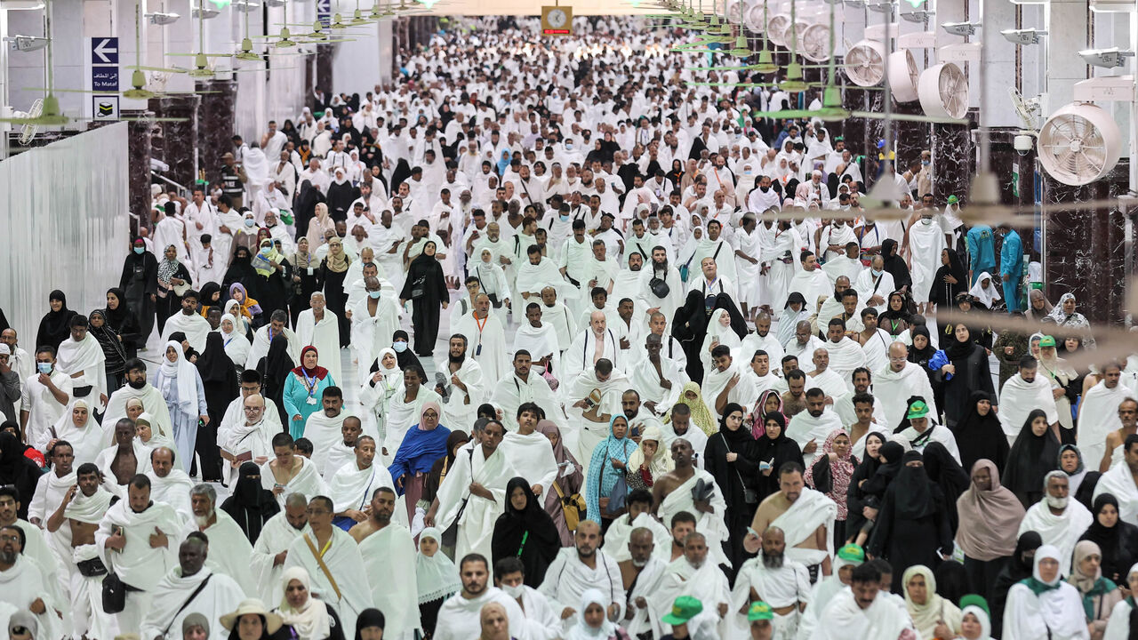 Muslim worshippers performing the umrah pilgrimage walk between the Marwa and Safa hills at the Grand Mosque on the first day of the holy fasting month of Ramadan, Mecca, Saudi Arabia, March 23, 2023.