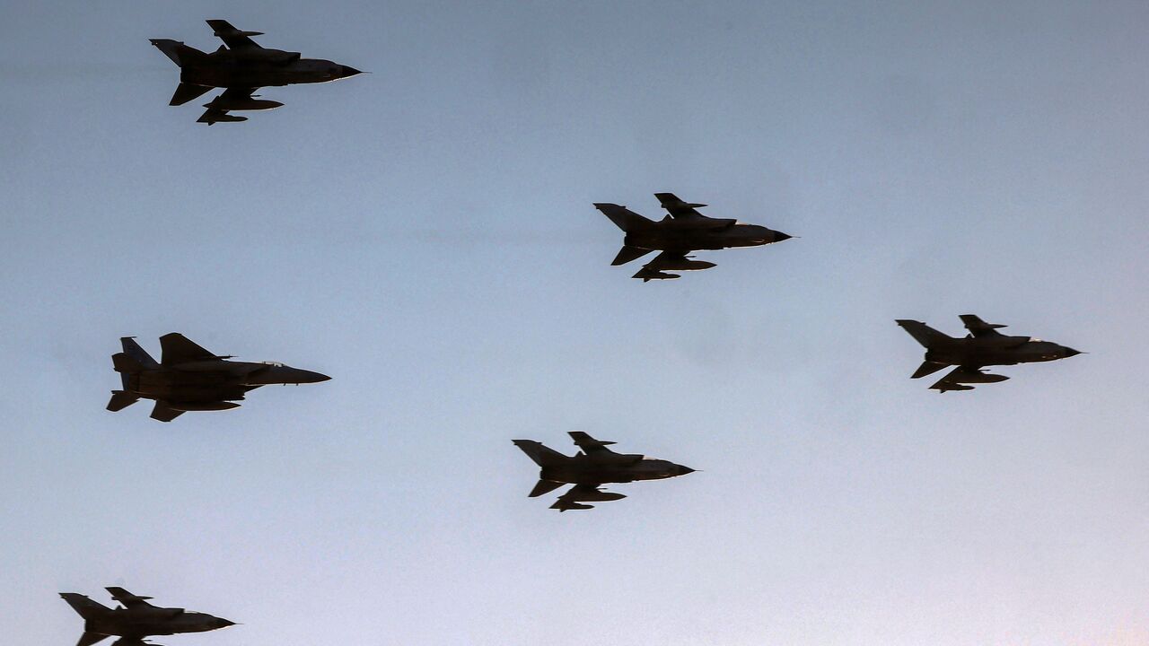 Royal Saudi Air Force Panavia Tornado and F-15 Eagle fighter aircraft fly over during an airshow marking Saudi Arabia's 93rd National Day celebrations in Riyadh on September 23, 2023. (Photo by Fayez Nureldine / AFP) (Photo by FAYEZ NURELDINE/AFP via Getty Images)