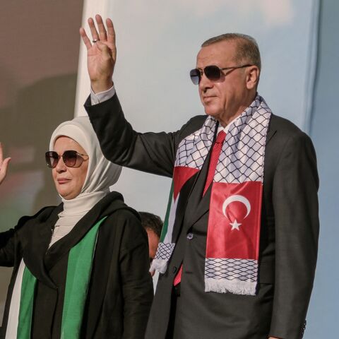 Turkish President, Recep Tayyip Erdogan, and his wife, Emine Erdogan, attend a rally in solidarity with Palestinians in Istanbul on October 28, 2023. 