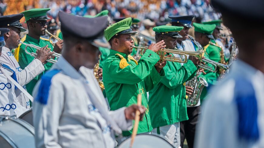 Members of a band play music s they participate in a demonstration in support of Somalia's government following the port deal signed between Ethiopia and the breakaway region of Somaliland at Eng Yariisow Stadium in Mogadishu on January 3, 2024. Somalia vowed to defend its territory after a controversial Red Sea access deal between Ethiopia and the breakaway state of Somaliland that it branded as "aggression". (Photo by ABDISHUKRI HAYBE / AFP) (Photo by ABDISHUKRI HAYBE/AFP via Getty Images)