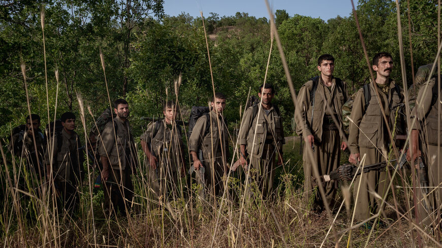 Fighters of PKK inside Matin mountain north of Dohuk in a temporary base after leaving Turkish territory, on June 22, 2013. 