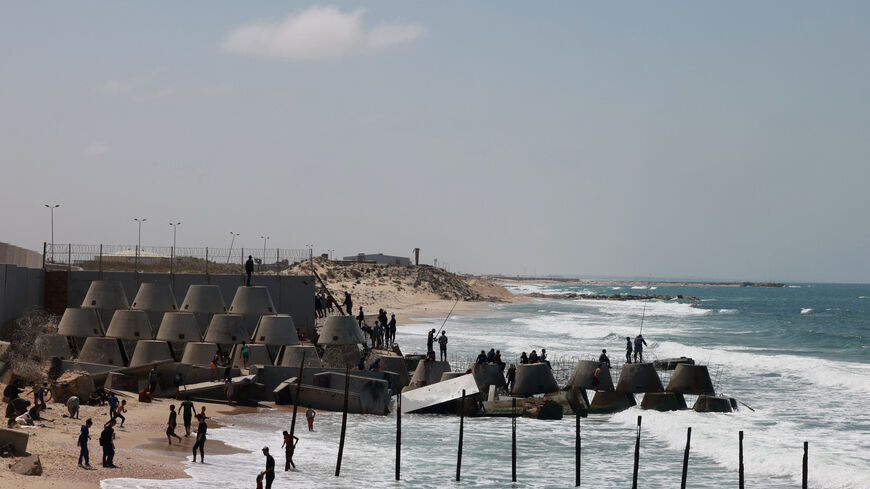 Displaced Palestinians practice their hobbies at the beach in southern Gaza's Rafah near the border with Egypt on April 11, 2024, amid the ongoing conflict between Israel and the Palestinian Hamas militant group. (Photo by MOHAMMED ABED / AFP) (Photo by MOHAMMED ABED/AFP via Getty Images)