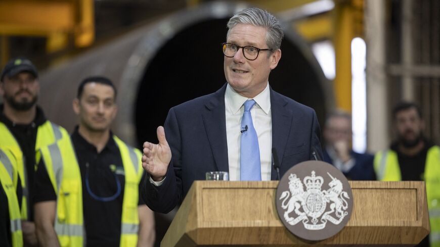 Britain's Prime Minister Keir Starmer delivers a speech during a visit to Hutchinson Engineering in Widnes, north of England, on July 25, 2024. 