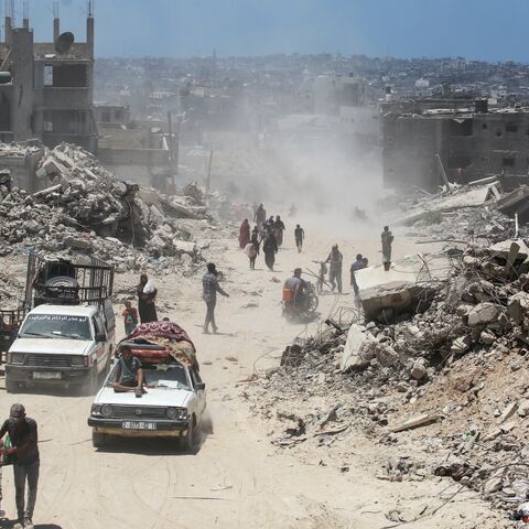 Amid the ongoing conflict between Israel and the Palestinian militant group Hamas, displaced Palestinians return to Bani Suhayla and neighboring towns east of Khan Younis following reports of Israeli forces withdrawing from the area in the southern Gaza, July 30, 2024.