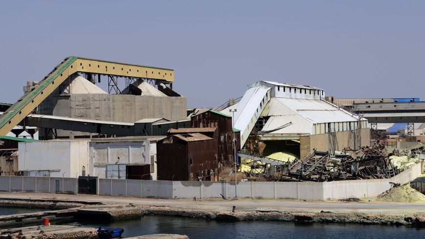 A picture taken on April 14, 2015 shows a view of a plant processing phosphates in the port of the Tunisian southern city of Sfax. / AFP / FETHI BELAID (Photo credit should read FETHI BELAID/AFP via Getty Images)