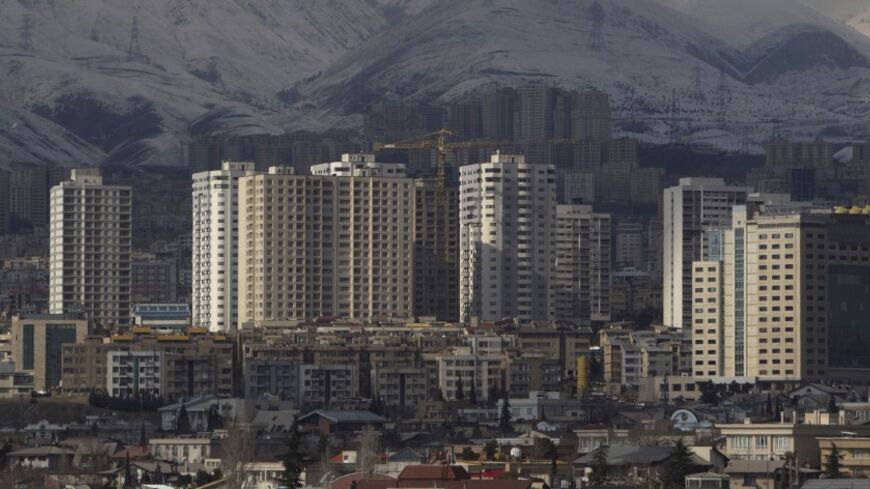 EDITORS' NOTE: Reuters and other foreign media are subject to Iranian restrictions on their ability to report, film or take pictures in Tehran. 

A general view of housing complexes in northwestern Tehran on a clear day February 12, 2011. REUTERS/Morteza Nikoubazl (IRAN - Tags: CITYSCAPE ENVIRONMENT) - RTR2IHNH