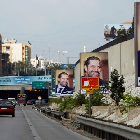 Posters depicting Saad al-Hariri, who announced his resignation as Lebanon's prime minister from Saudi Arabia, is seen at airport high way in Beirut, Lebanon November 19, 2017. REUTERS/Jamal Saidi - RC119900A480