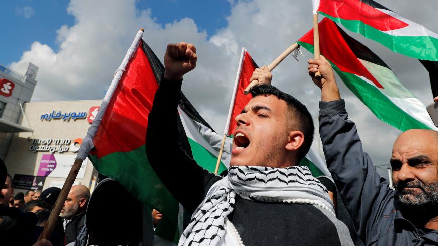 Israeli Arabs take part in a protest against the U.S. President Donald Trump's Middle East peace plan in the town of Baqa Al-Gharbiyye, northern Israel February 1, 2020. REUTERS/Ammar Awad - RC2PRE9SJ8D4