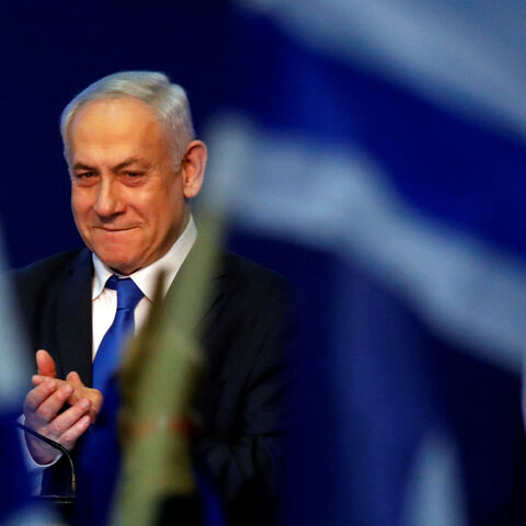 Israeli Prime Minister Benjamin Netanyahu reacts upon his arrival to address his supporters following the announcement of exit polls in Israel's election at his Likud party headquarters in Tel Aviv, Israel March 3, 2020. REUTERS/Amir Cohen - RC20CF9CV5B1