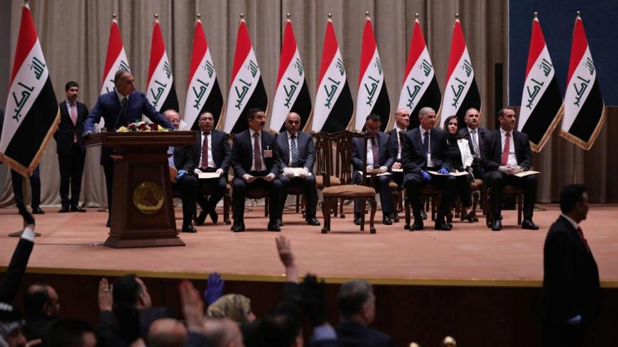 Iraqi Prime Minister-designate Mustafa al-Kadhimi delivers a speech during the vote on the new government at the parliament headquarters in Baghdad, Iraq, May 7, 2020. Iraqi Parliament Media Office/Handout via REUTERS ATTENTION EDITORS - THIS PICTURE WAS PROVIDED BY A THIRD PARTY. - RC2IJG9BR3JH